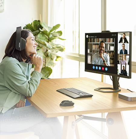 Women is having a meeting Philips video conferencing monitors