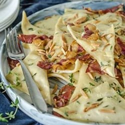 Leek and Potato Ravioli with a Creamy Thyme, Almond and Pancetta Sauce